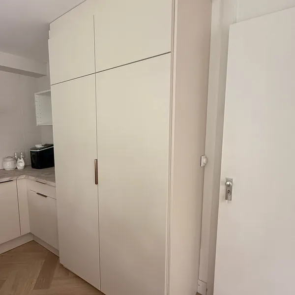 Tall cabinet wall