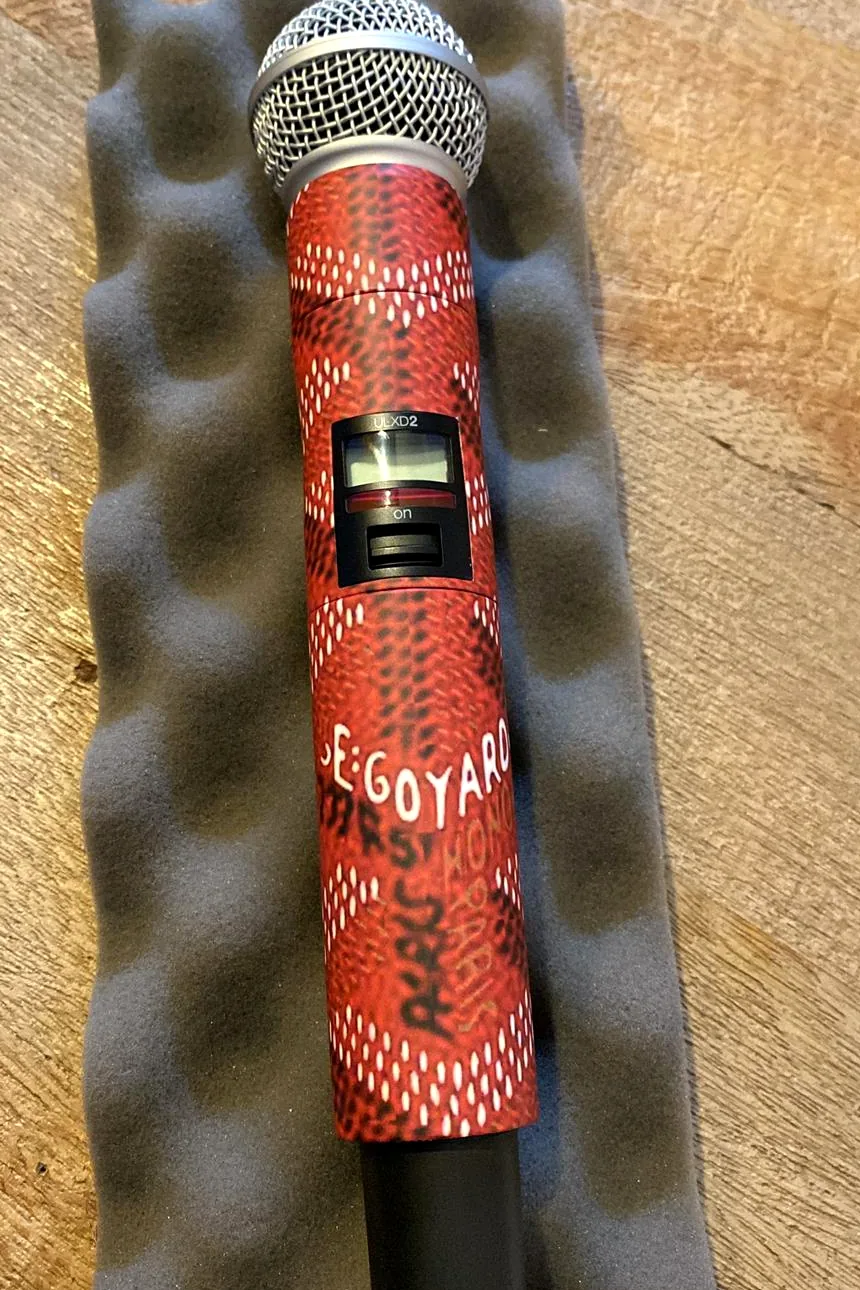 After: the same microphone wrapped in a red custom print