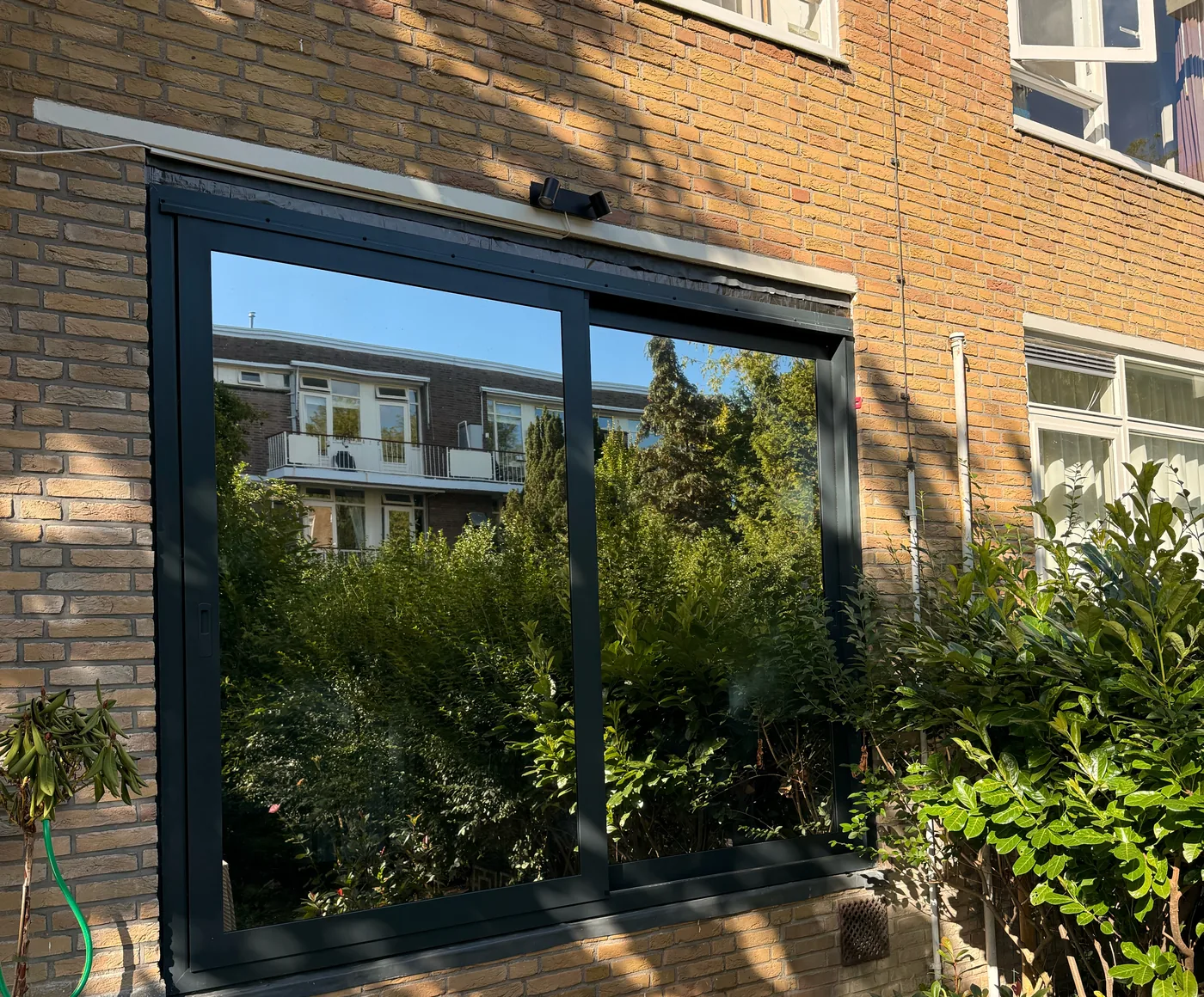Window with window film, seen from outside: reflective, no view in
