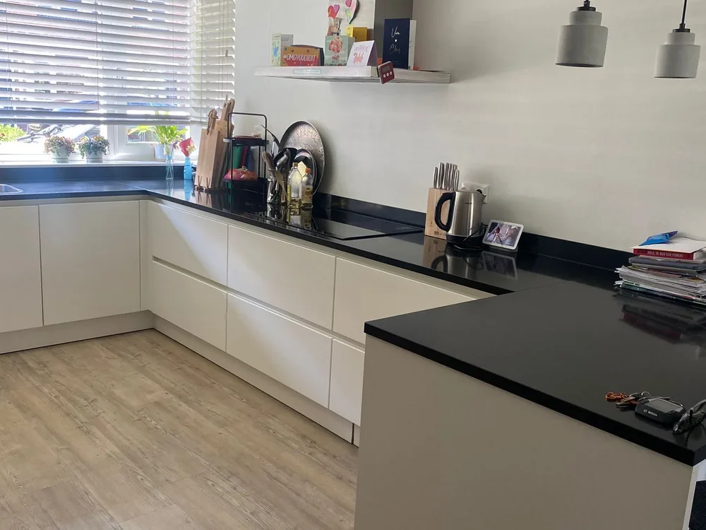 Before: the same kitchen in high-gloss white