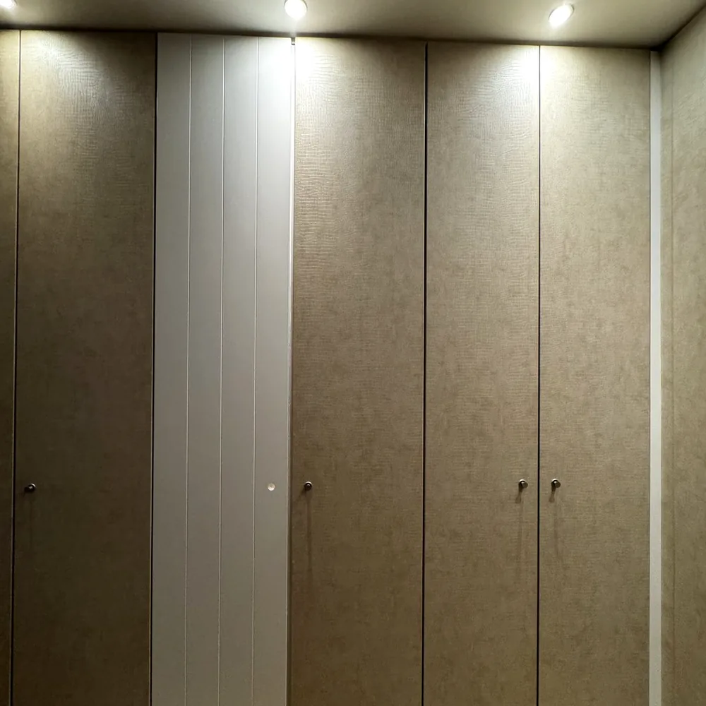 Cabinet wall with doors in a beige leather look