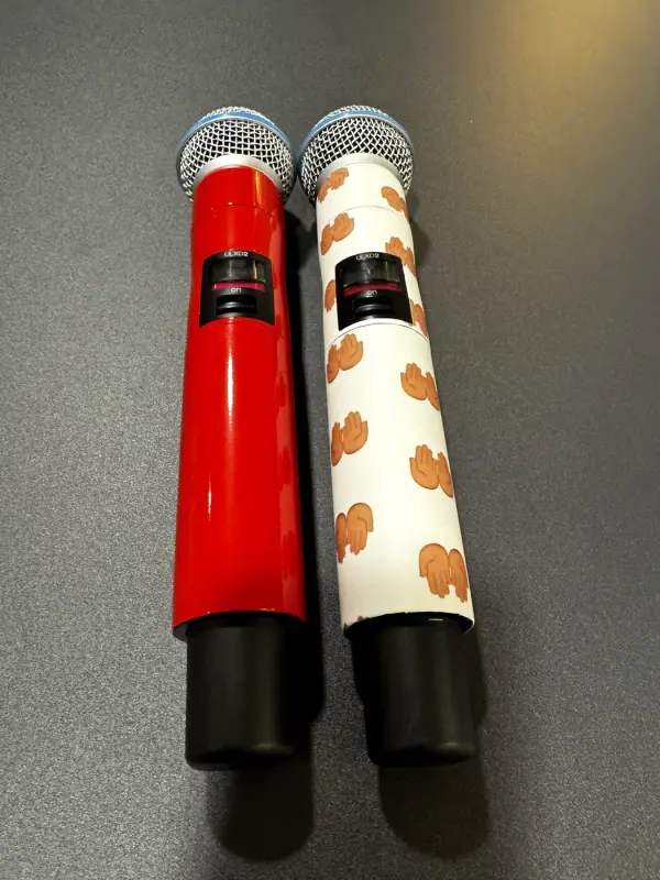 Two microphones in red and a custom print, close up