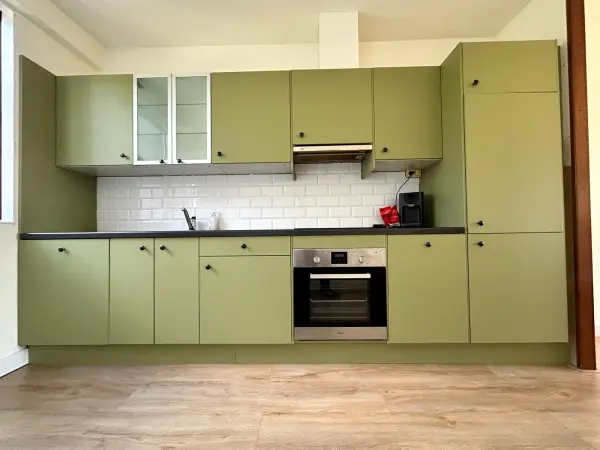 After: kitchen in matt green, straight on