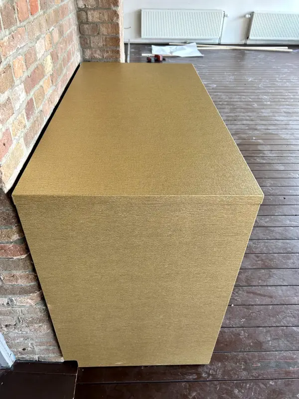 Top with a gold sheen
