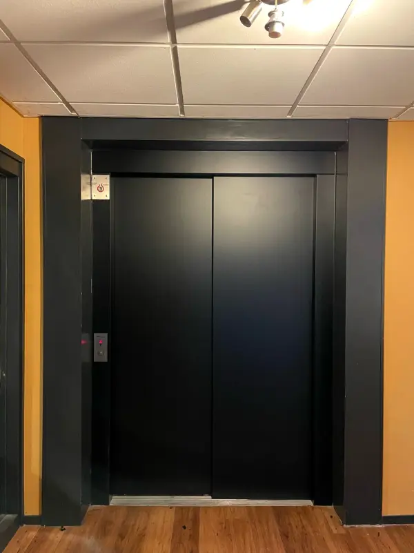 After: lift doors in matt black with a black frame
