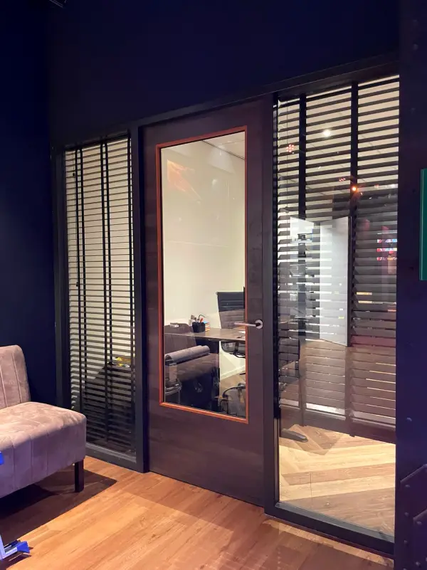 Before: office door with clear glass, in the evening