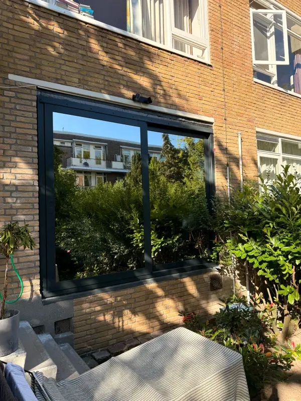 Window with window film from outside: reflective, no view in