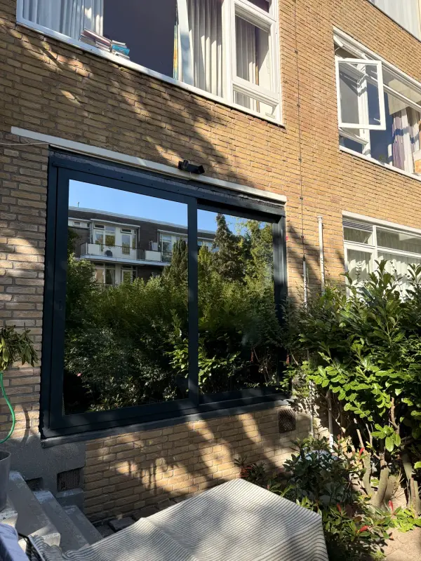 Facade with window film, seen from outside at an angle