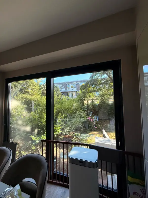 Window with window film from inside, with a balcony