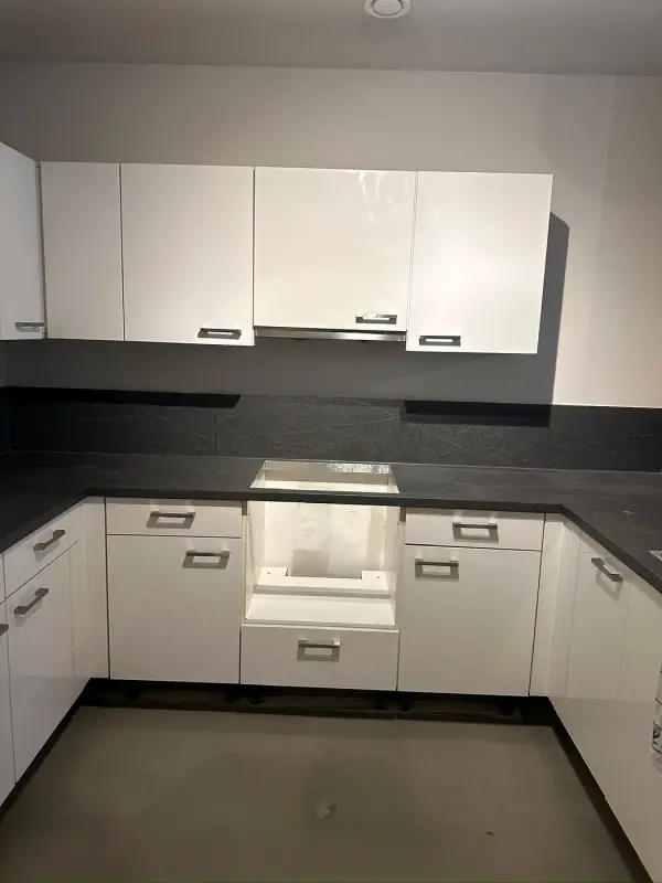 Before: U-shaped kitchen in white