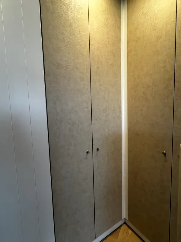 Cabinet doors in a beige leather look
