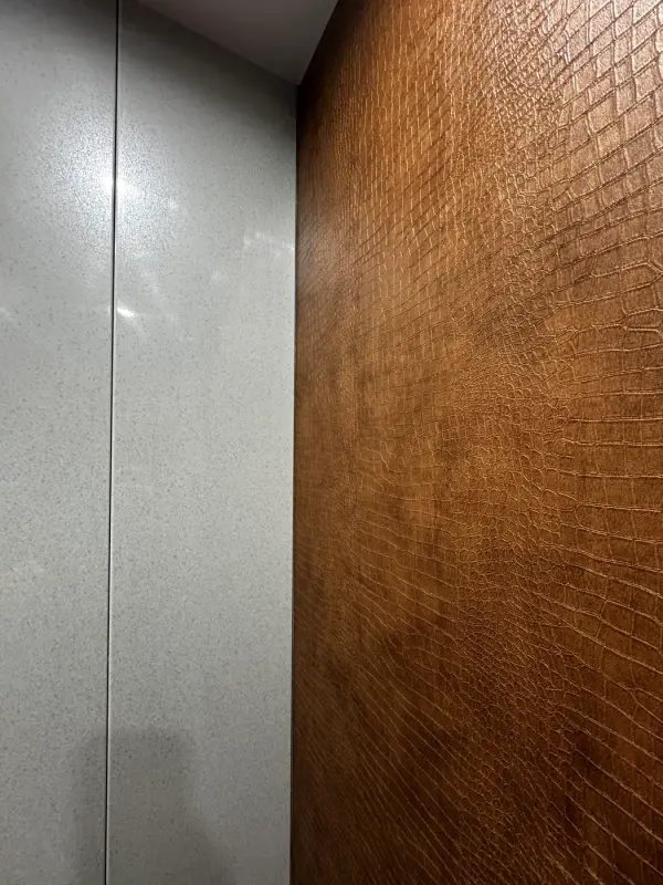 Lift wall in a brown leather look, close up