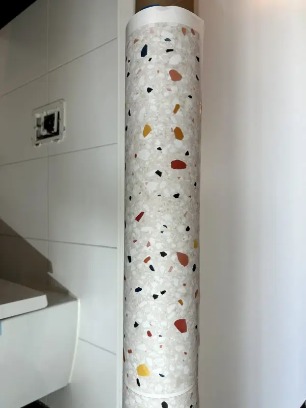 During: narrow wall wrapped in a terrazzo look