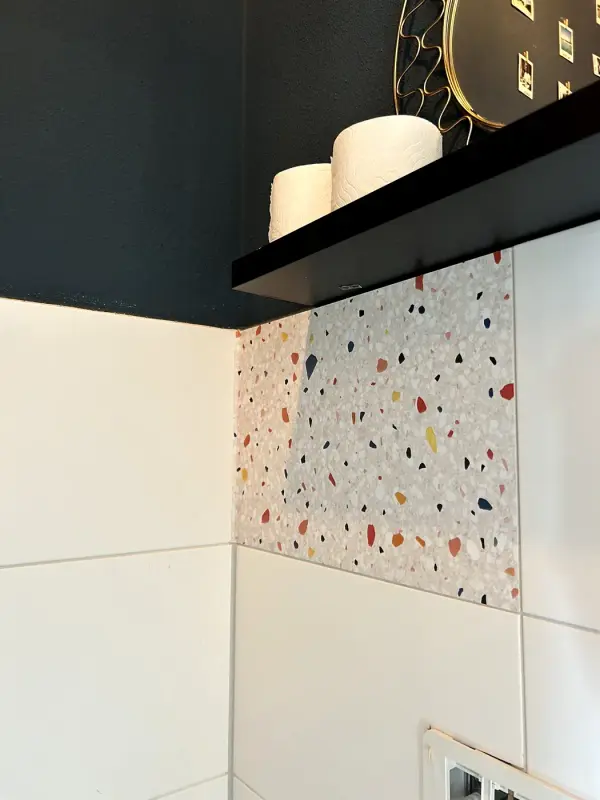 During: the first strip of terrazzo film under the shelf